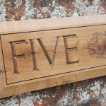 Five, house sign.